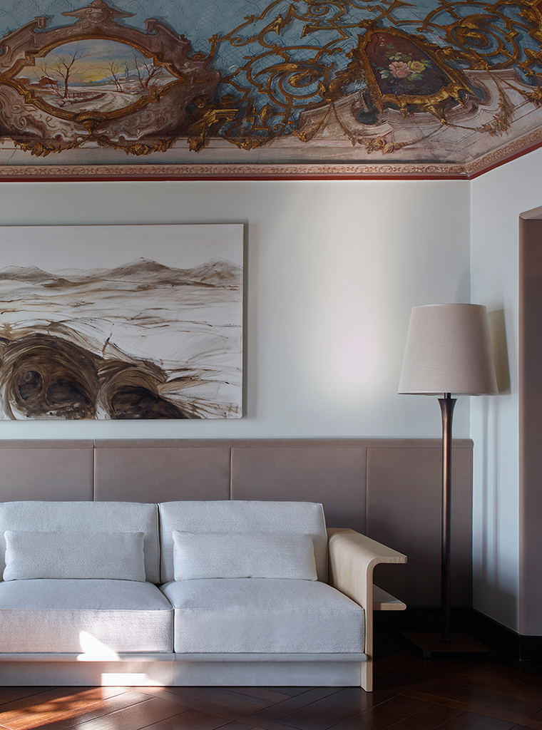 A considered interior with sculptural furniture and layered textures